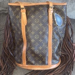 Louis Vuitton tote bag with fringe and gorgeous stone. In beautiful condition!
